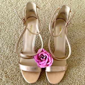 Beautiful golden rose sandals.